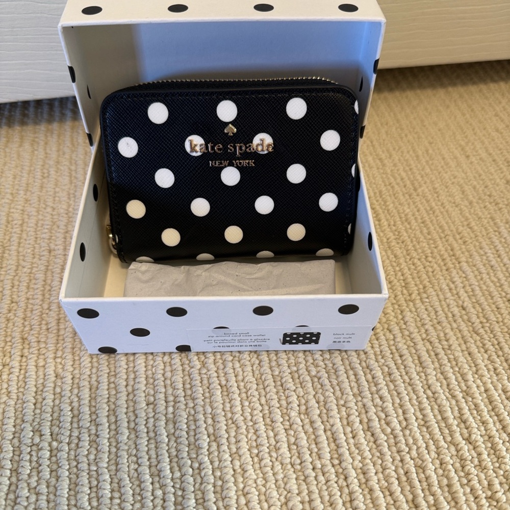 Kate Spade Boxed small zip around card case wallet.